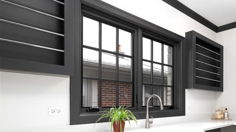 Black molding in white kitchen