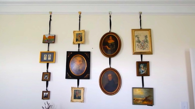 Traditional paintings hanging on molding