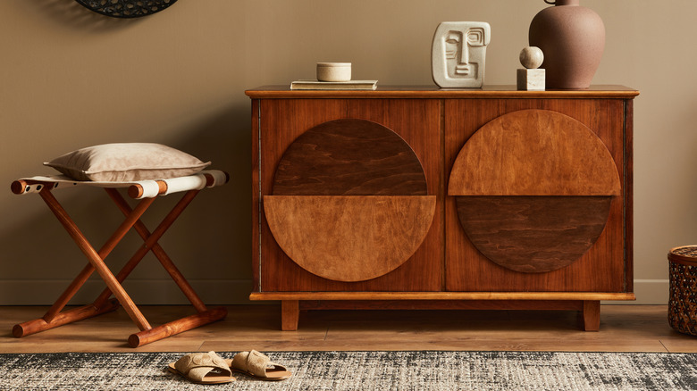 wooden sideboard table with circle details