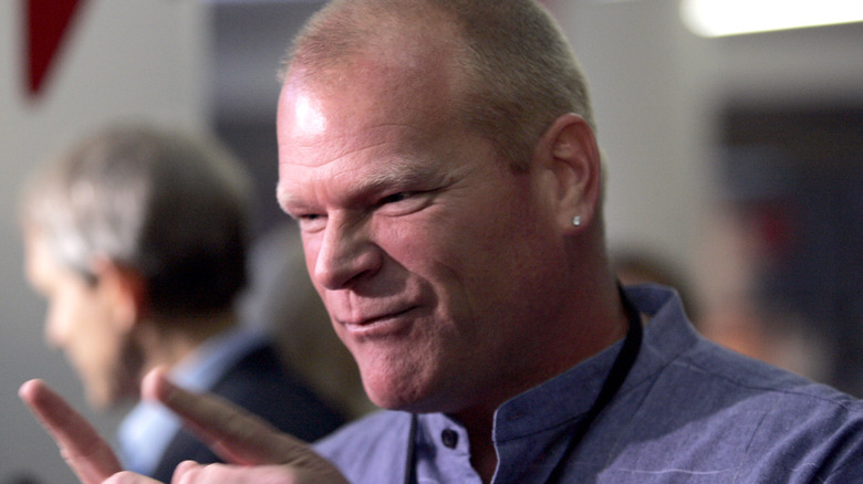 Mike Holmes in a blue collared shirt