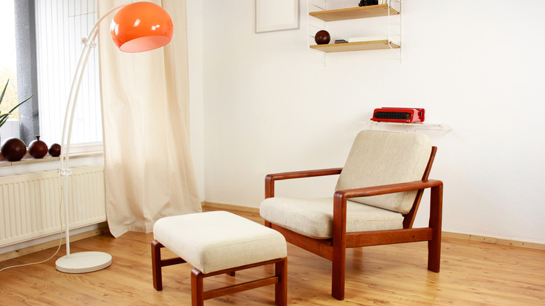 A minimalist living room with 1960s furniture.