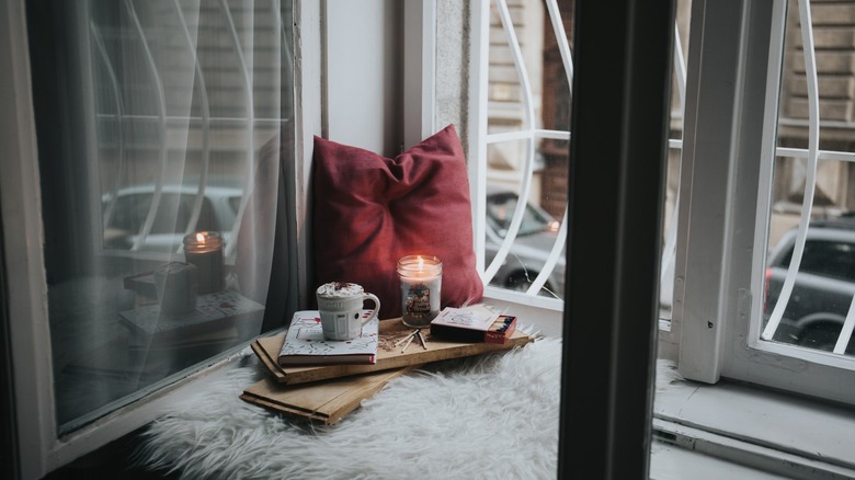 pillow and coffee tray by window