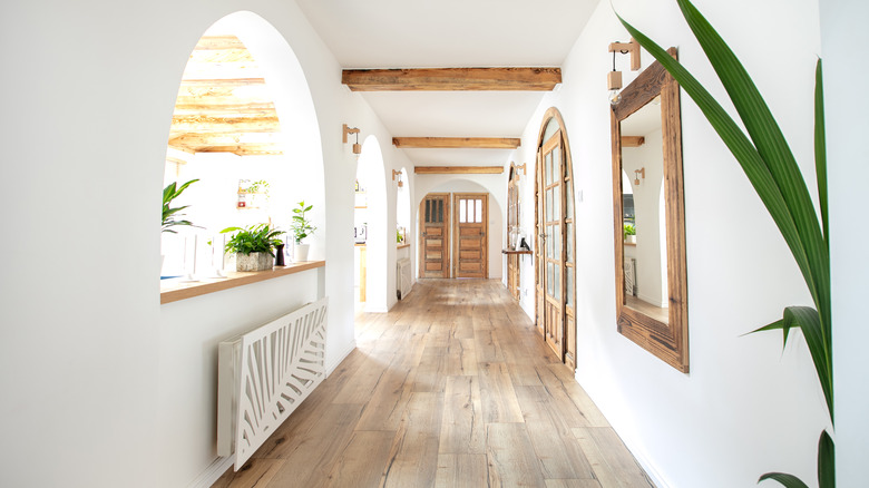 white hallway with wood