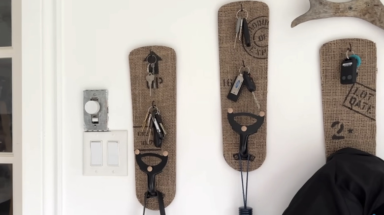 DIY rustic burlap wall decor with hooks.