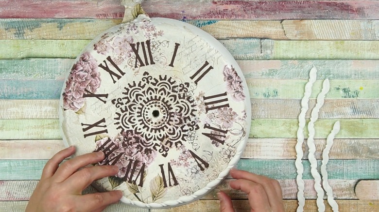 A decoupaged skillet as clock face