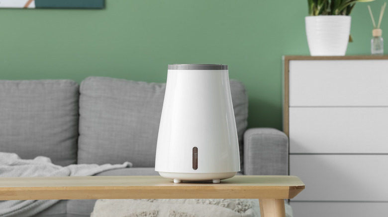 Air humidifier on a table in a living room