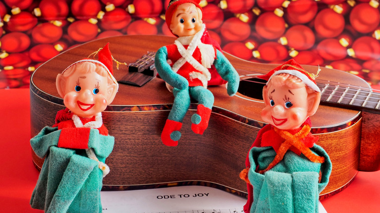 Three vintage Christmas elves
