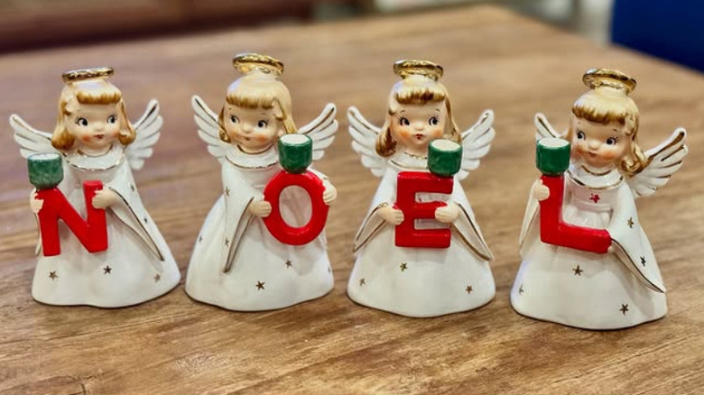Vintage angels Christmas decorations on counter