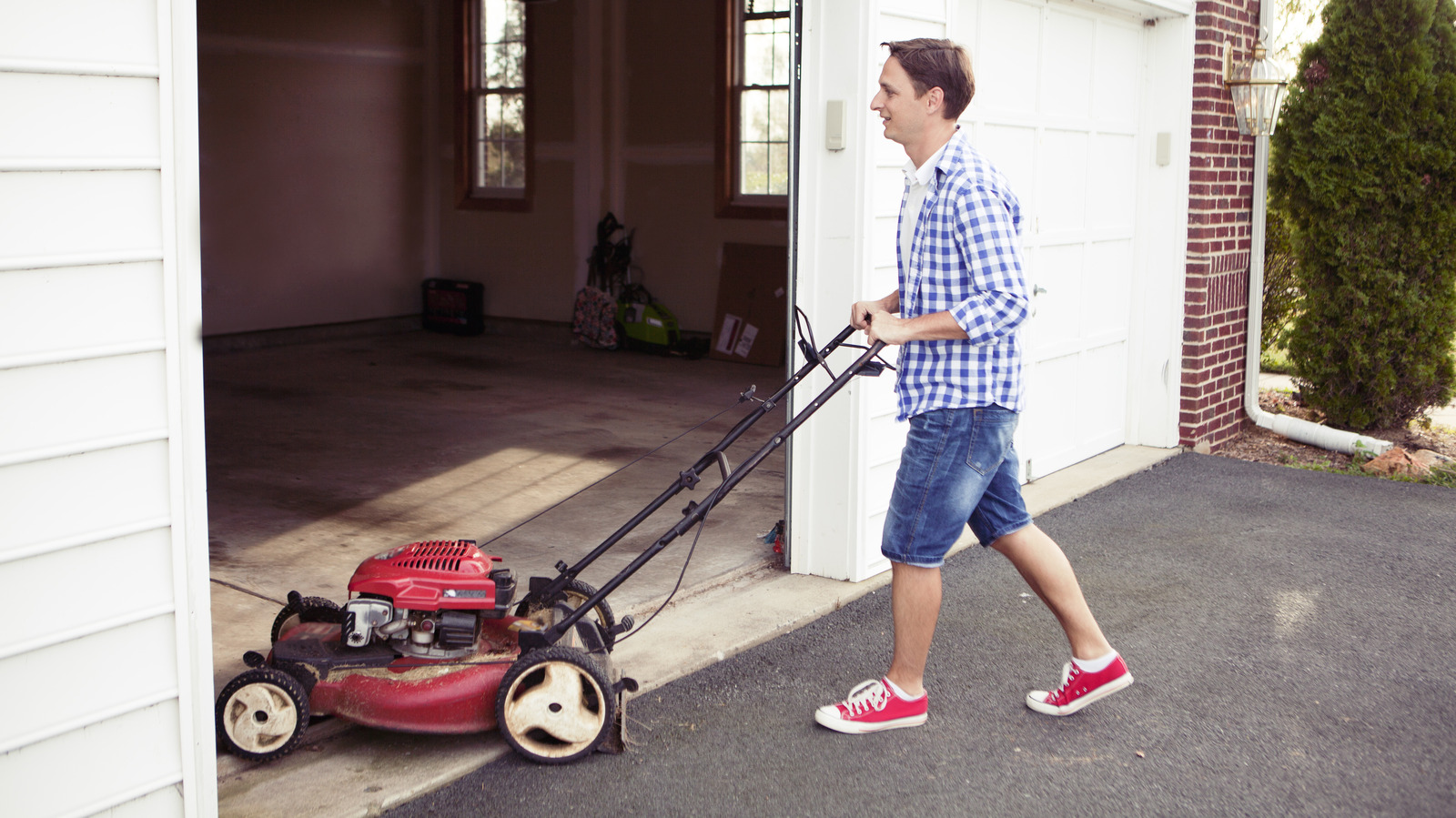 If Your Garage Smells Like Gasoline After Mowing, Here's What's Wrong