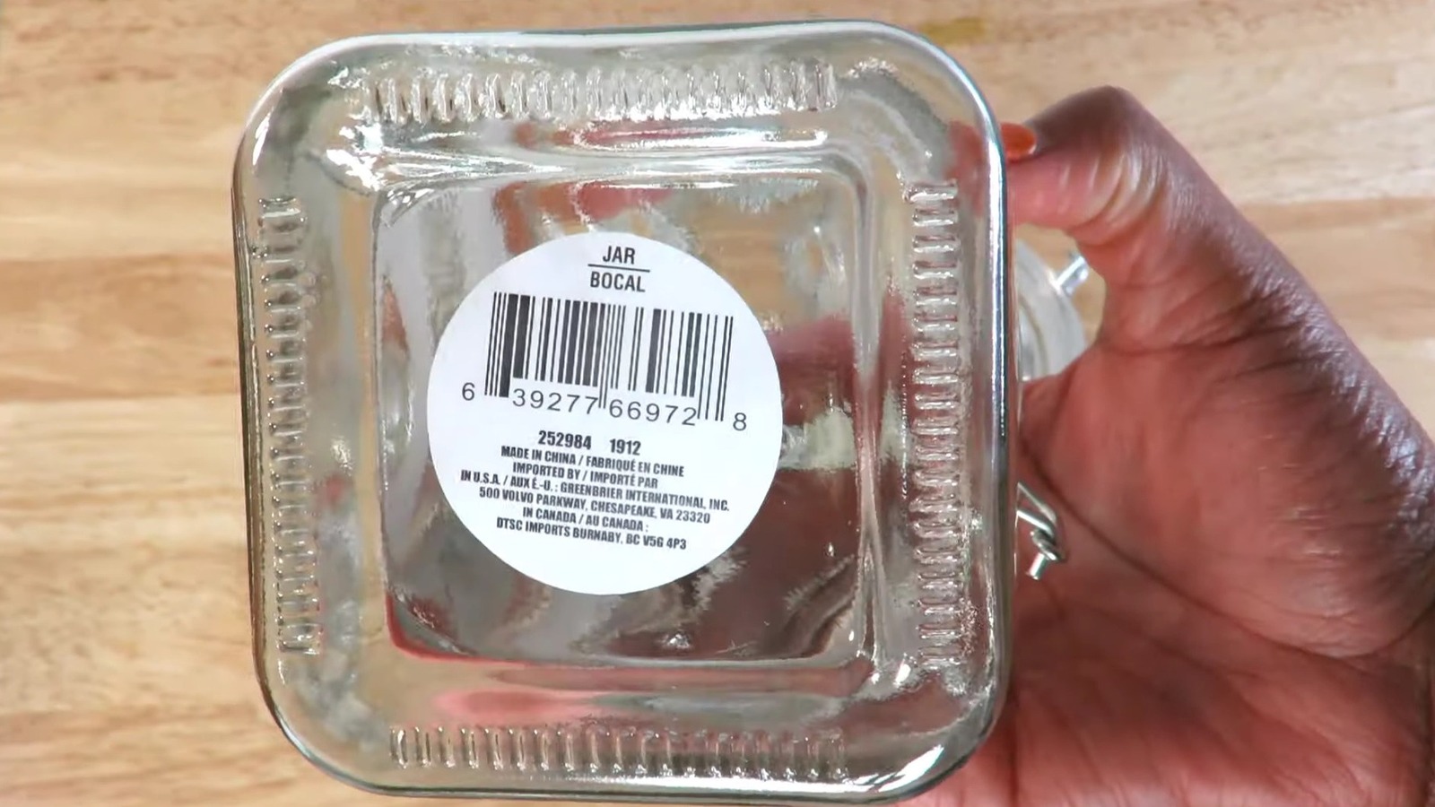 A Piece Of Plastic Wrap Will Help You Remove Those Pesky Price Tag Stickers