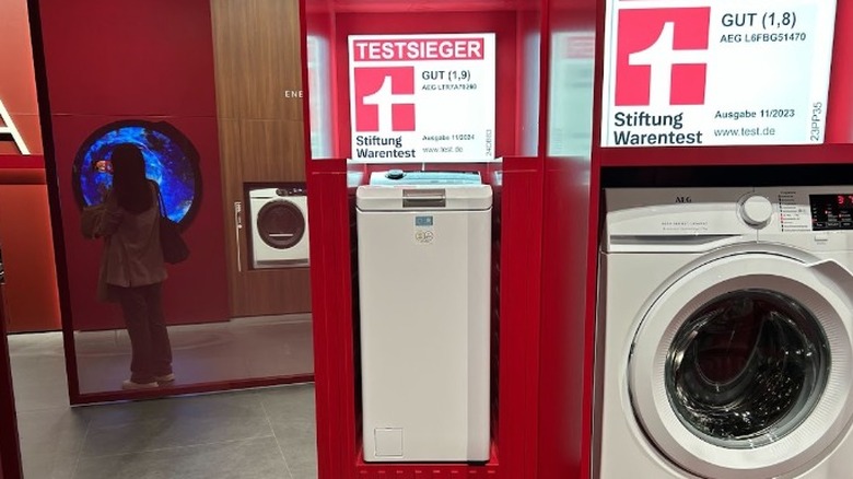 White, narrow steam washing machine AEG 7000 ProSteam on display at IFA 2025