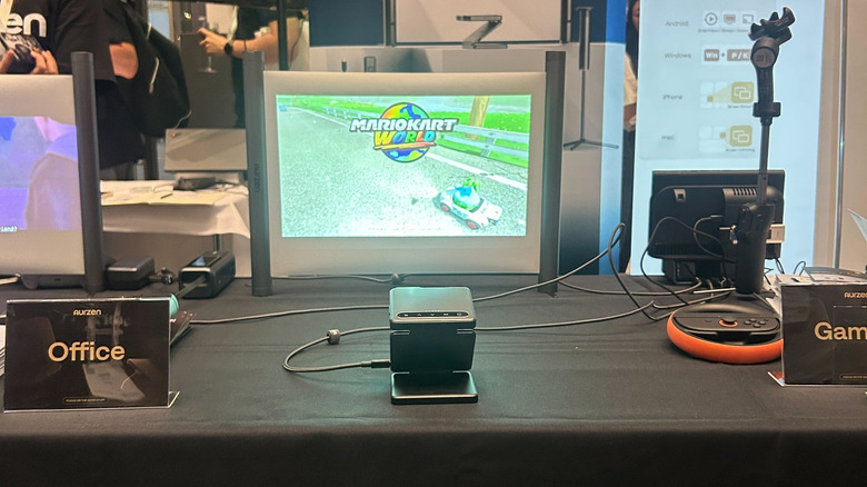Aurzen Zip projecting Mario Kart World at IFA 2025 booth