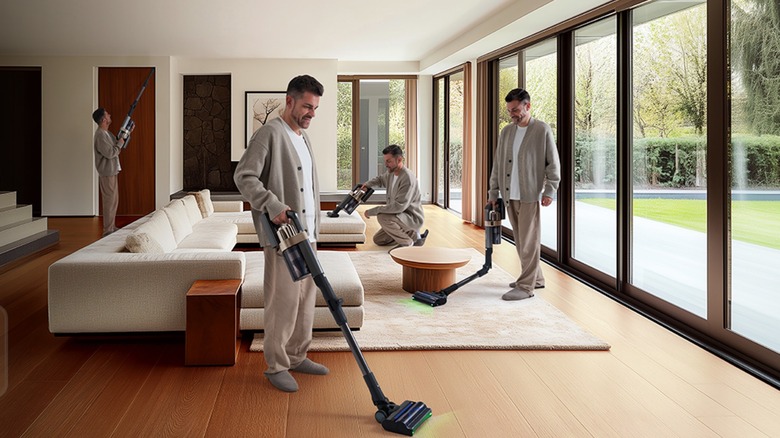 A man uses the Tineco PURE ONE A90S to vacuum various areas of an elegant living room