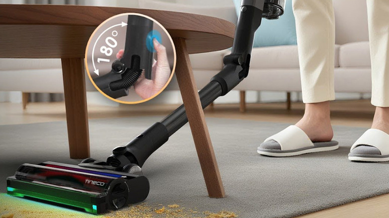The Tineco PURE ONE A90S 180° Foldable Vacuum Tube easily cleans messy crumbs under a coffee table
