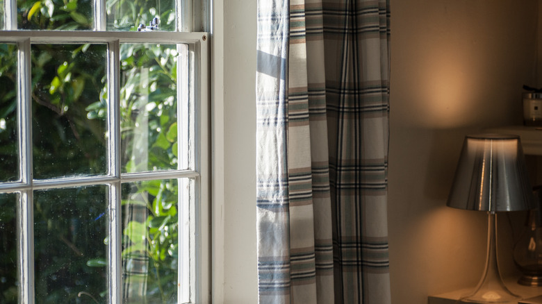 Curtains on one side of a window