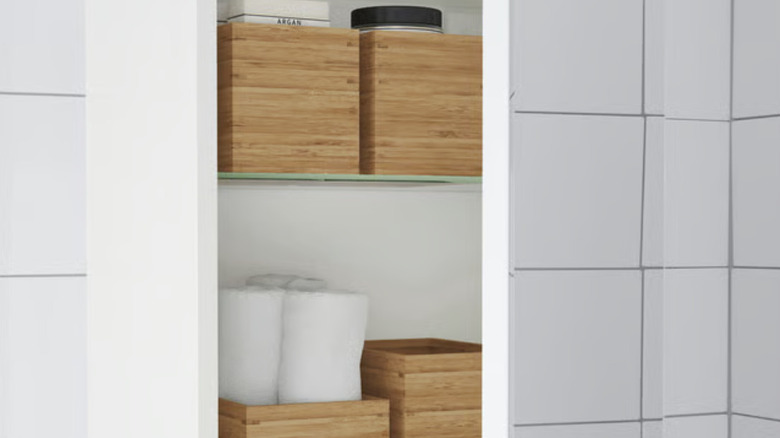 IKEA bamboo bathroom organizers in cabinet