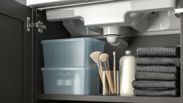 IKEA RYKTA storage bin organizing cabinet in bathroom