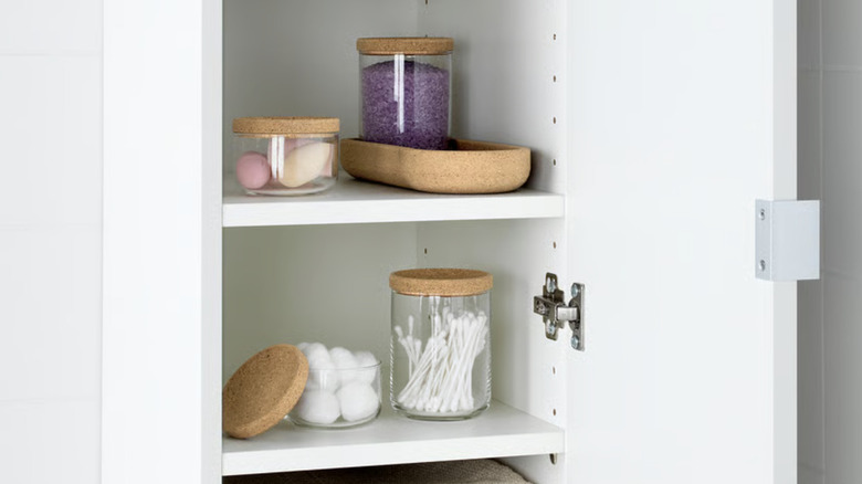 IKEA jar set in bathroom cabinet