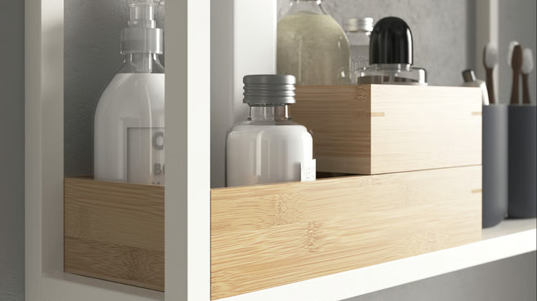 IKEA bamboo organizers holding soaps and lotions