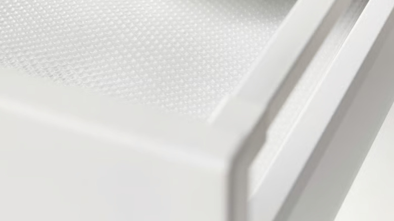 IKEA clear drawer liner in cabinet