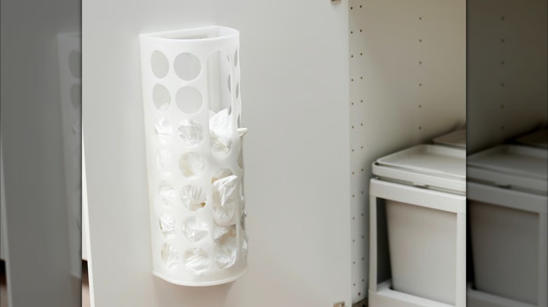 IKEA VARIERA plastic bag dispenser inside cabinet door