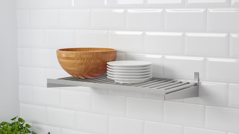 dishware on metal wall rack