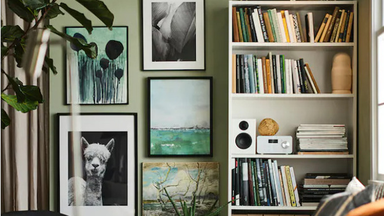 White tall bookcase filled with books