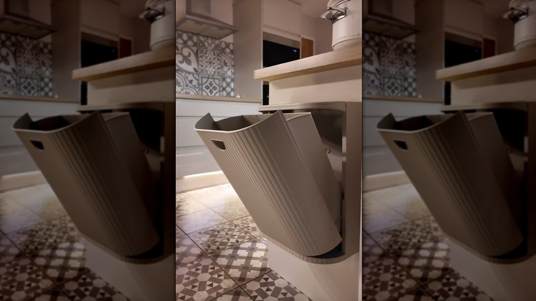 The IKEA GÅRDSBUTIK bin mounted to the side of a kitchen counter