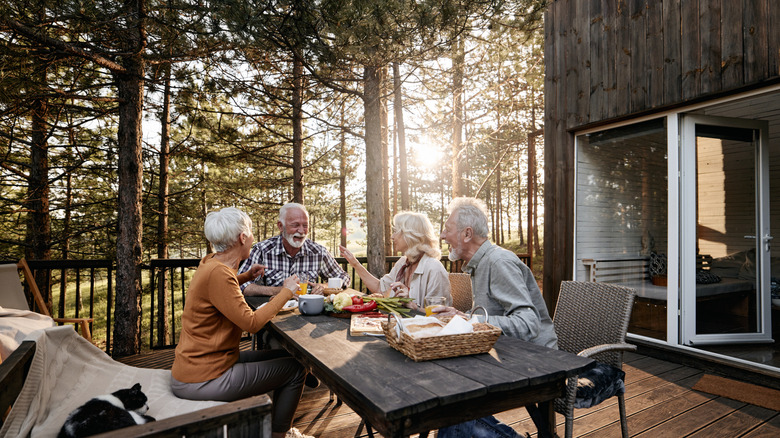 Friends chatting on a beautiful patio outside