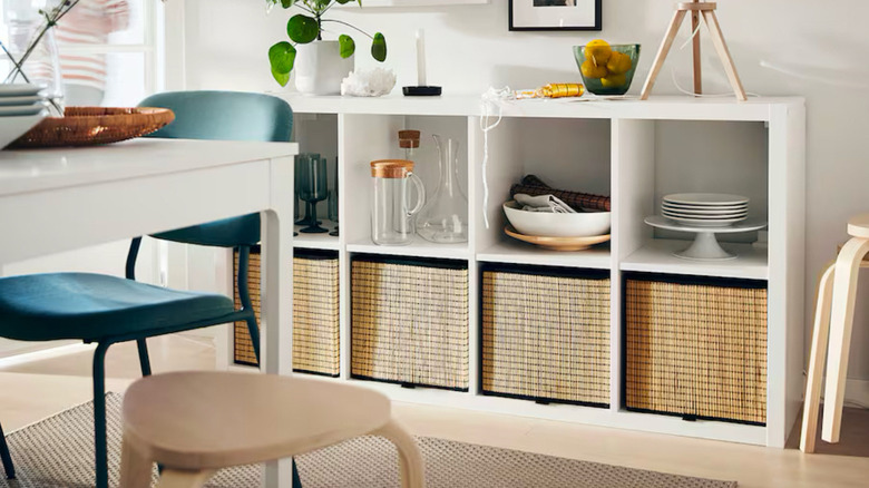 An IKEA KALLAX shelf used in a dining area