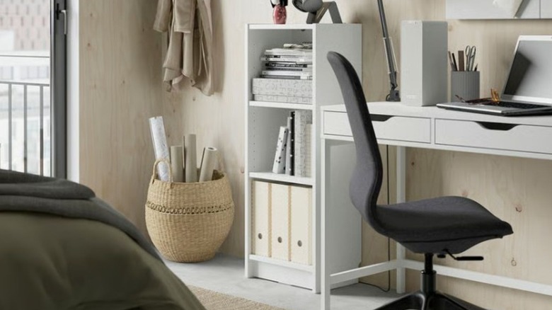 Billy Bookcase with books in a room with a desk and office chair
