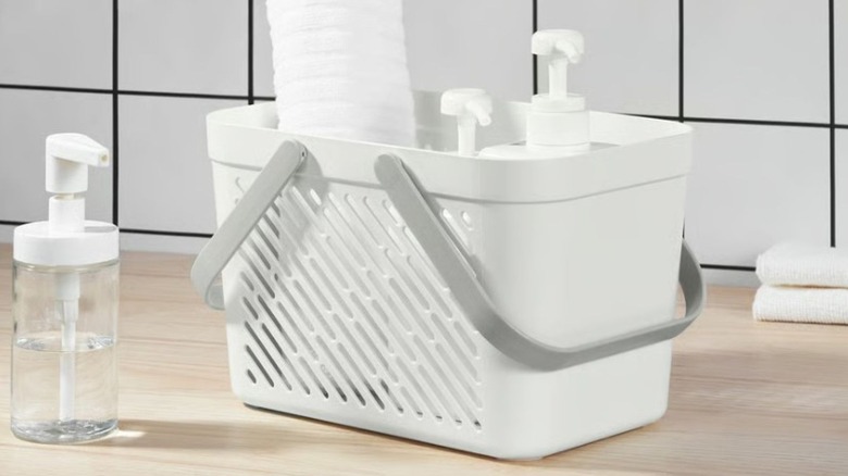 Woven plastic basket with various bath items