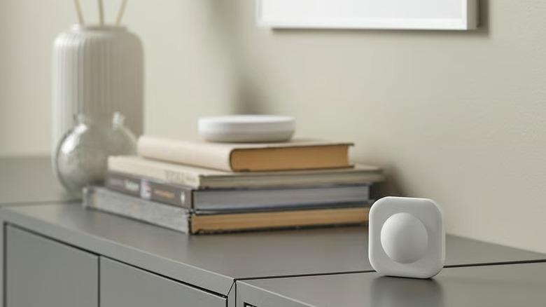 A motion sensor placed on an entryway table