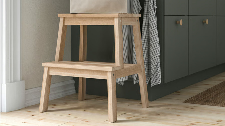 IKEA BEKVÄM stool in rubberwood color, used in modern kitchen