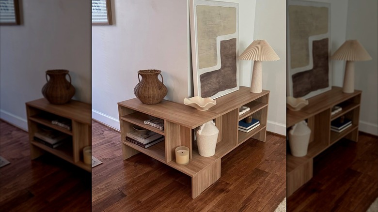 Two IKEA HOLMERUD side tables pushed together in corner