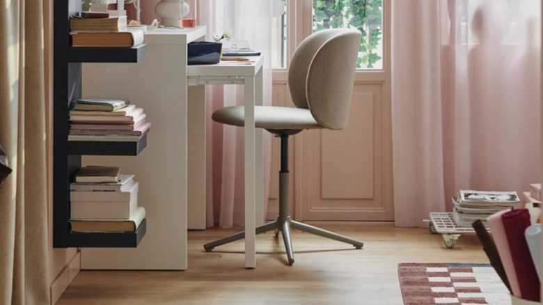 IKEA LÄNGDHOPP in the corner of a room with an office chair