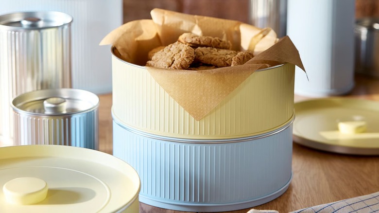 Stacks of IKEA BETTHAJ kitchen storage tins with cookies