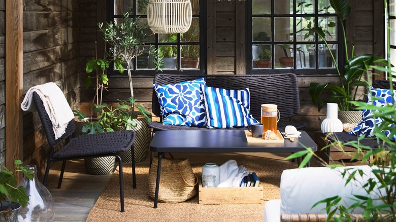 IKEA TEGELÖN set on patio with outdoor accessories and decorations