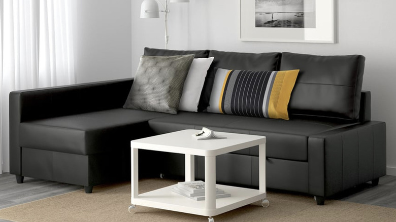 Black IKEA FRIHETEN against white decor