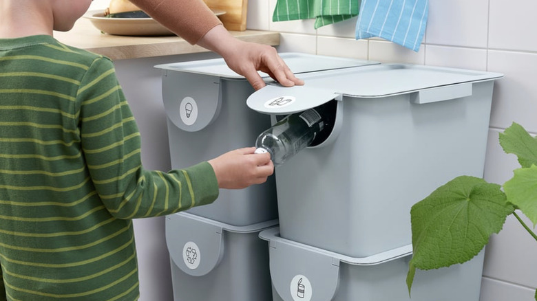 IKEA TRÖSKNING bin being used for sorting recycling