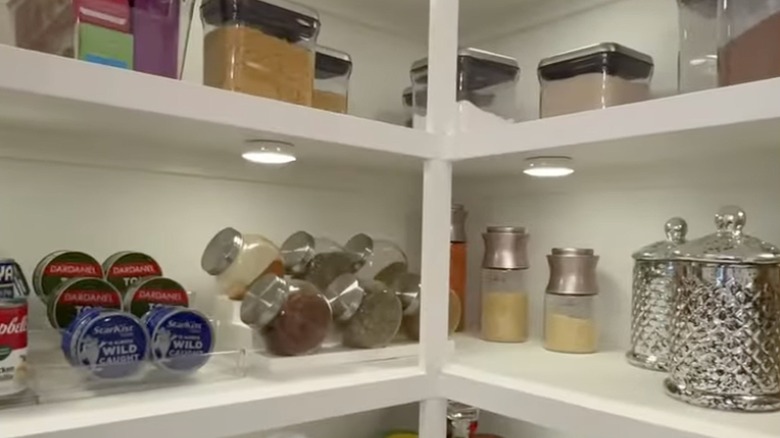 LED push lights shining on pantry items