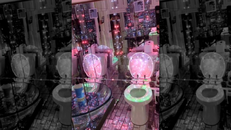 Mirrored bathroom renovation with lights and mirrors everywhere