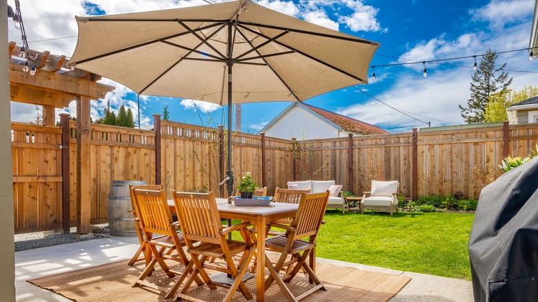 outdoor furniture under patio umbrella