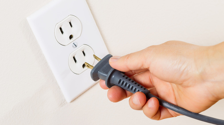 unplugging cord