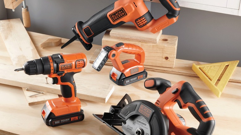 Collection of four modern Black and Decker power tools