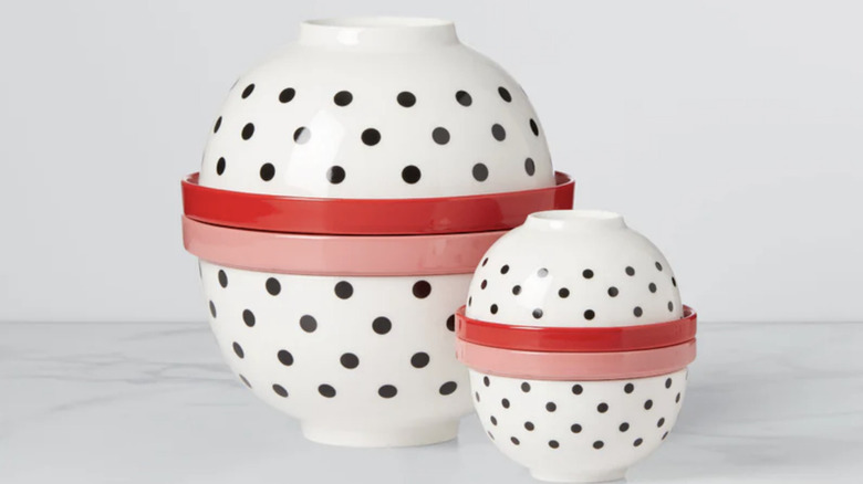Two nesting dish sets with black polka dots.