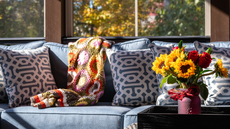 cozy screened-in porch with sofa