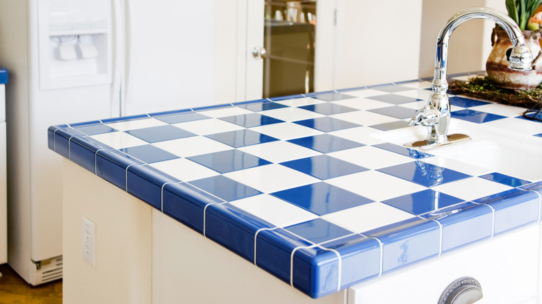 Blue and white square tile countertops.