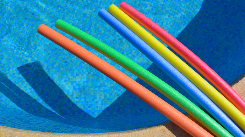 pool noodles over swimming pool