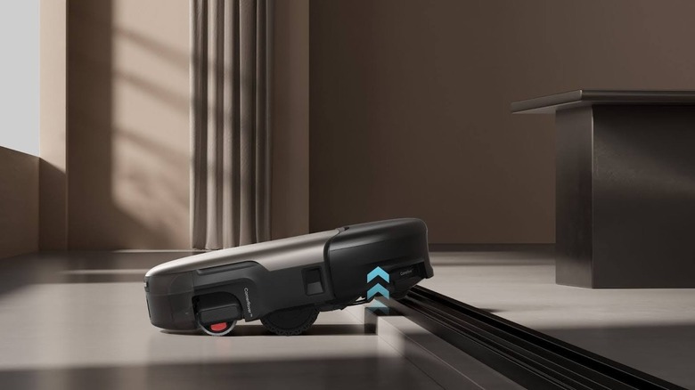 Eufy Marswalker robotic vacuum rising over ledge